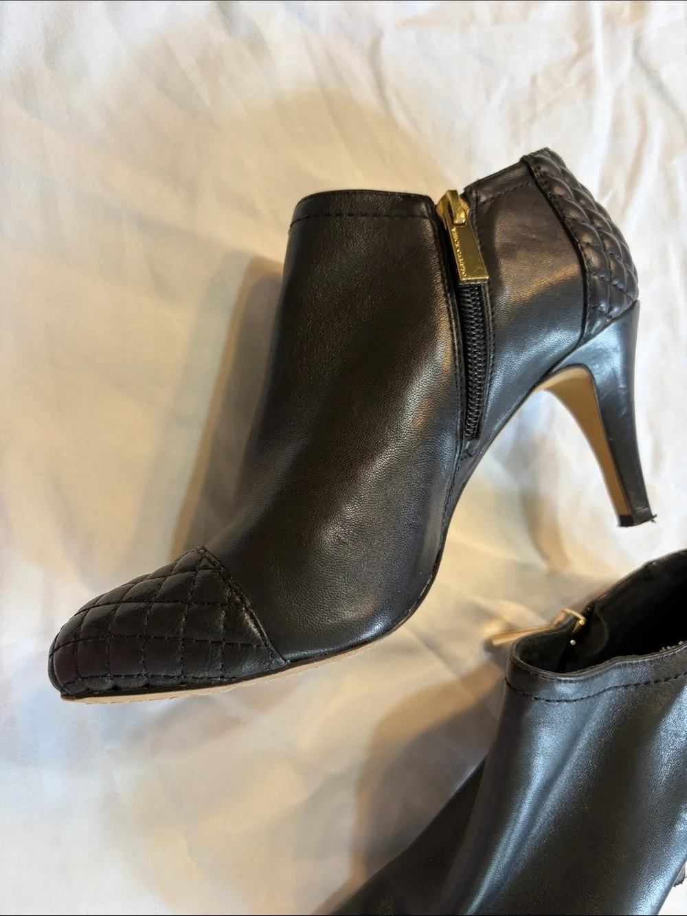 Vince Camuto Black Quilted Cap-Toe Leather Ankle Booties with Gold Zipper